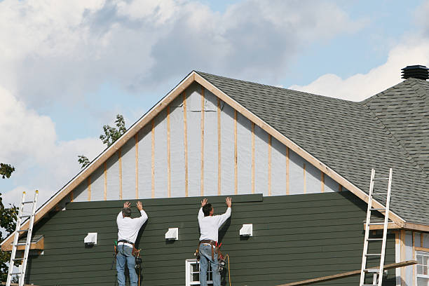 Professional Siding Replacement technician working in Trenton, GA